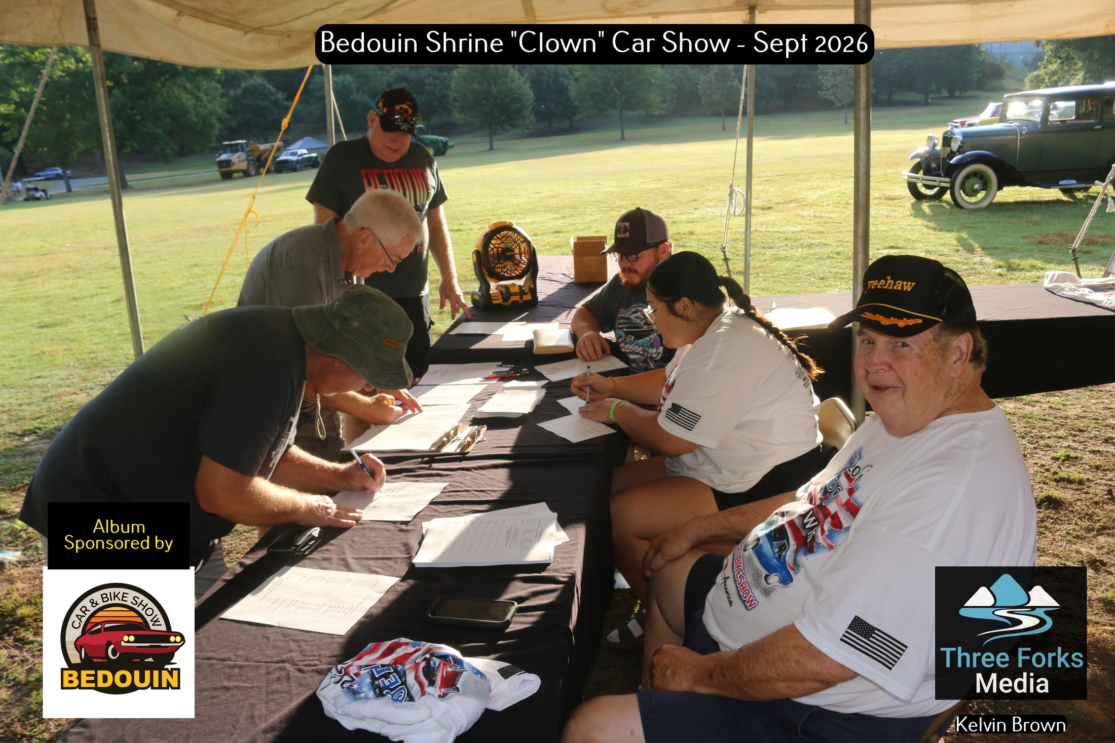 Volunteers and organizers at the registration table for the Bedouin Shrine Clown Unit Car Show at Honor Heights Park