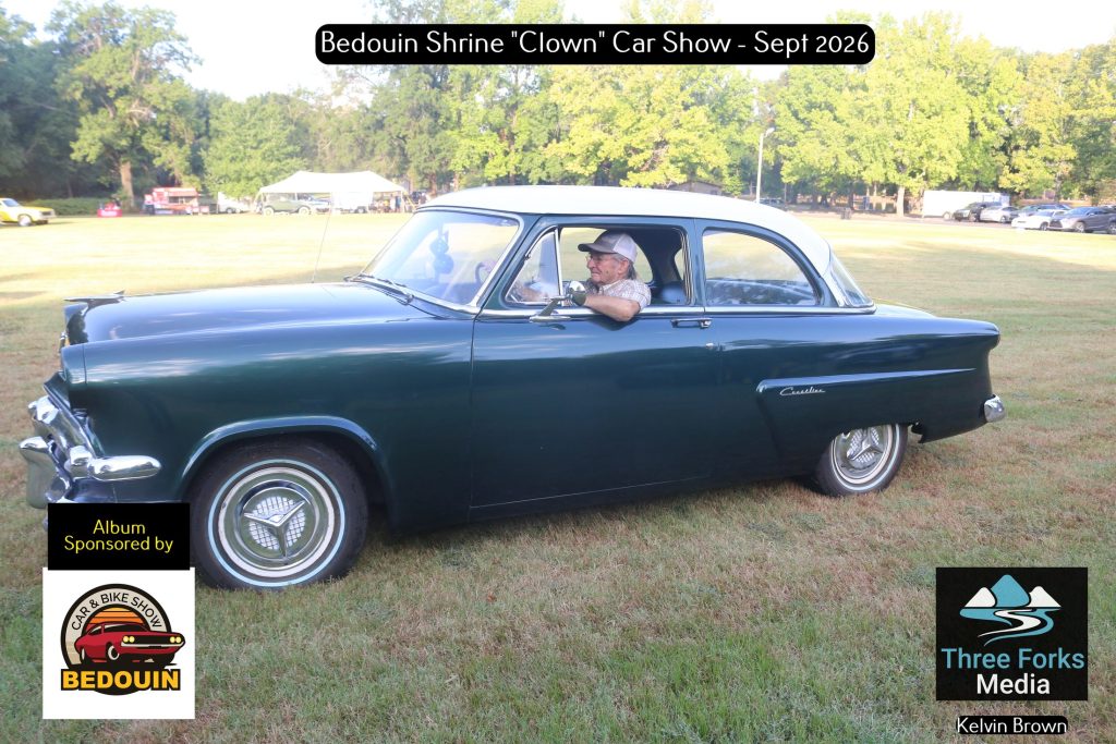 Dark green classic Ford at the Bedouin Shrine Clown Unit Car Show at Honor Heights Park