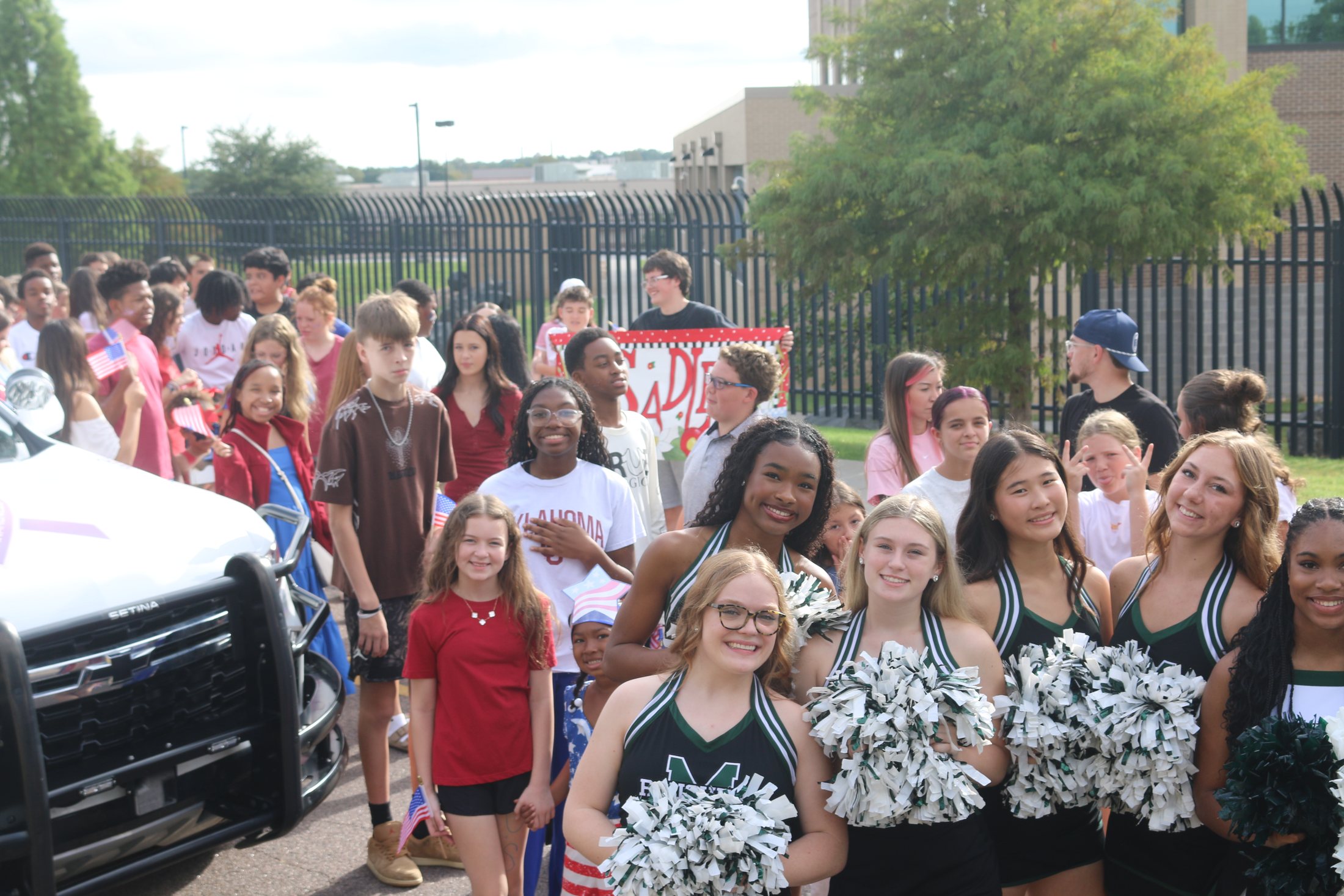 MHS cheerleaders marching in the Patriotic Parade